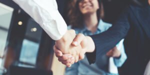 Two people shaking hands